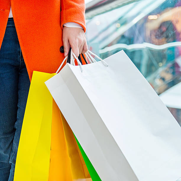 istock holding shopping bags 490642964