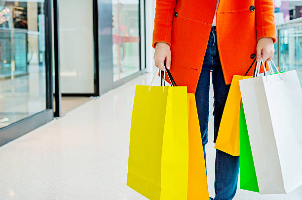 istock holding shopping bags 490643018