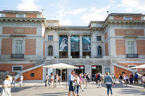 The Museo del Prado Madrid, Spain - September 23, 2014: People entering Museo del Prado, Madrid, Spain.  museo del prado stock pictures, royalty-free photos & images