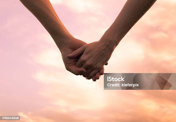 Holding Hands Stock Photo - Download Image Now - Holding Hands, Couple - Relationship, Hands Clasped