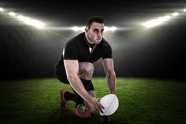 istock Composite image of rugby player getting ready to kick ball 490643680