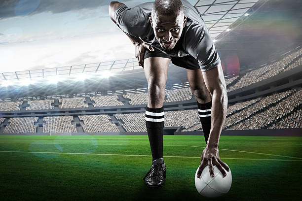 istock Composite image of rugby player playing on pitch 490643818