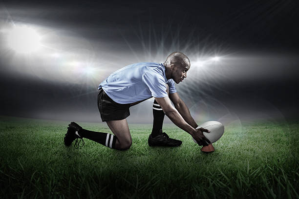 istock Composite image of rugby player keeping ball on kicking tee 490643862
