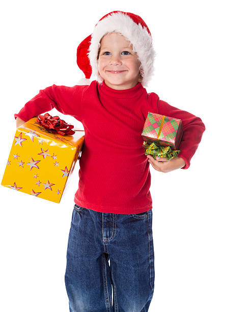 istock Little boy in christmas hat with gift boxes 490646374