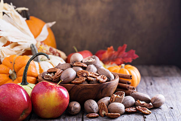 istock Pumpkins, nuts, indian corn and apples 490646386