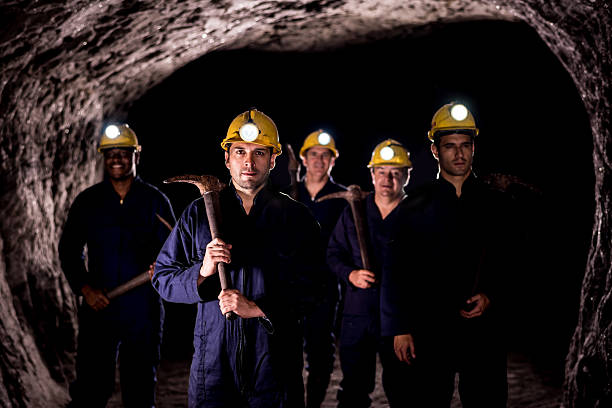 istock Group of miners working at the mine 490647660
