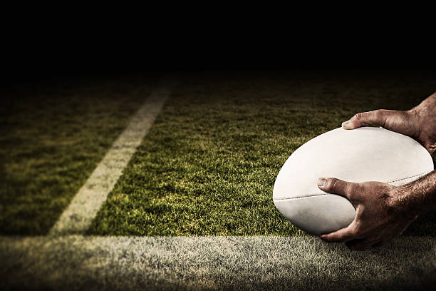 istock Composite image of sports player holding ball 490647794