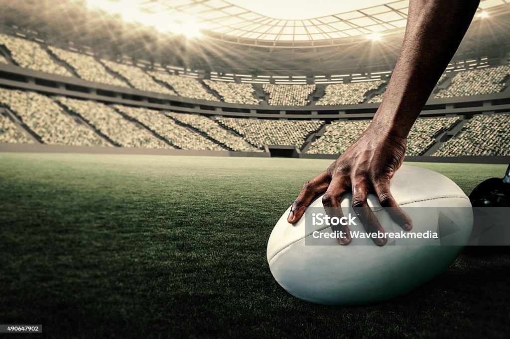 Composite-Bild der rugby-Spieler hält den ball - Lizenzfrei Rugby - Sportart Stock-Foto