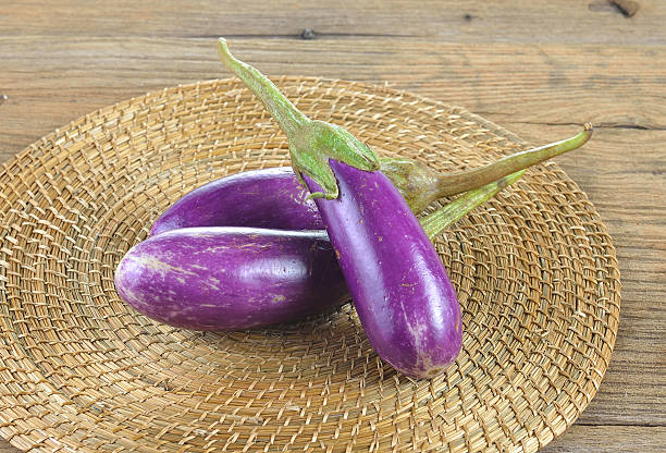 istock Fresh eggplant  on wooden  background 490647950