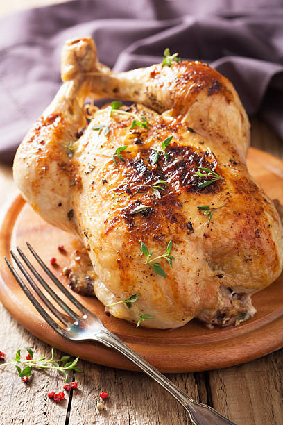 istock whole roasted chicken with pepper and thyme 490651501