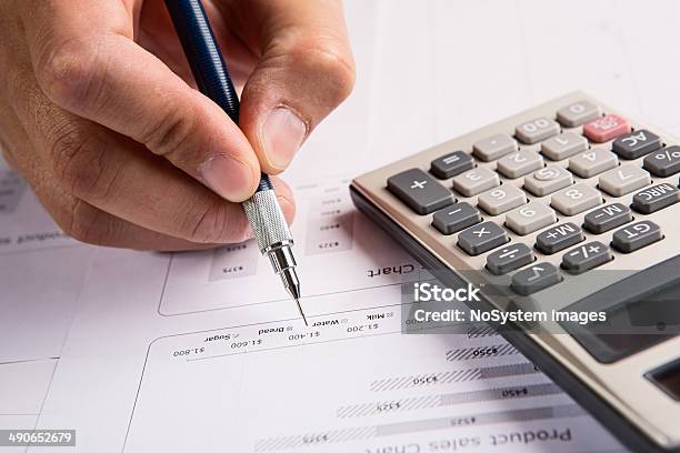 Analyzing Financial Data Stock Photo - Download Image Now - Analyzing, Annual Event, Balance