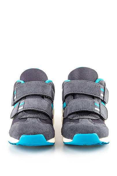 istock Sport shoes isolated white 490653159