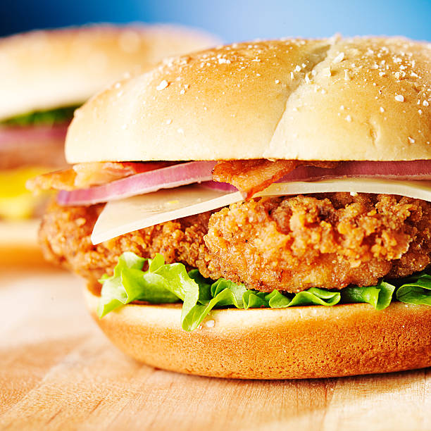 istock crispy chicken sandwich with bacon close up 490653629