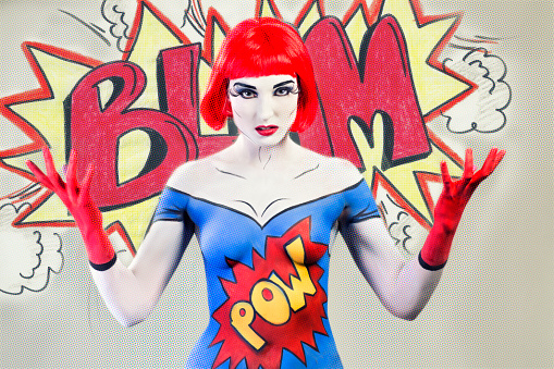 A woman in bodypaint as a comic superhero