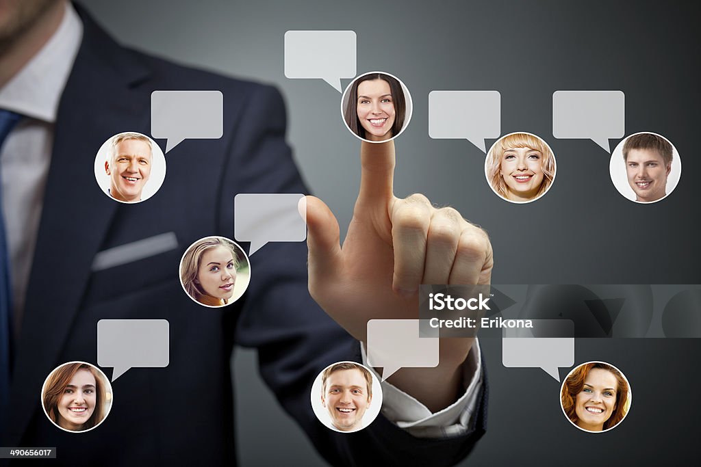 Social networking people Businessman touching social networking woman Adult Stock Photo