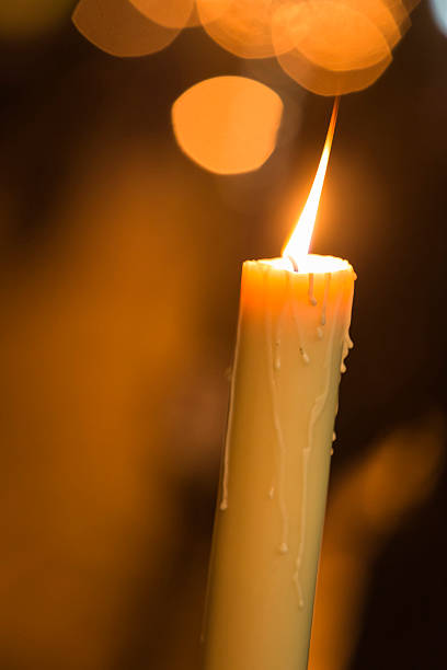 istock Candle light with light bokeh in the background 490656189