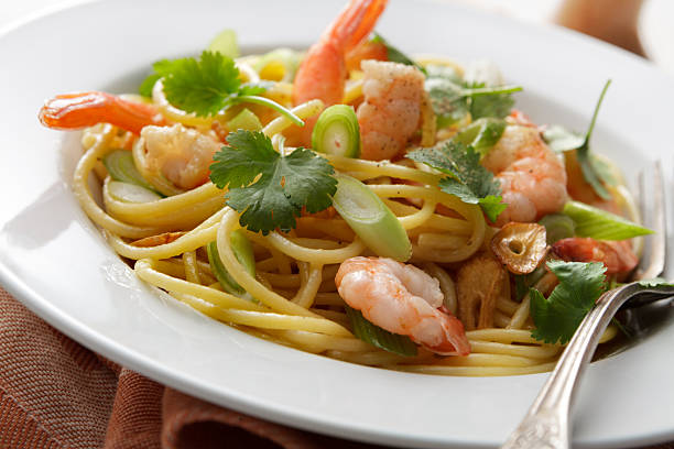 istock Italian Stills: Spaghetti with Shrimps, Spring Onions and Coriander 490657225