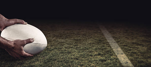 istock Composite image of sports player holding ball 490658050