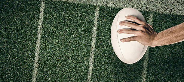 istock Composite image of rugby player scoring try 490658102