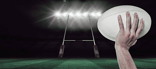 istock Composite image of rugby player holding ball 490658360
