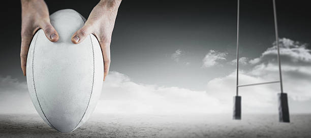 istock Composite image of rugby player holding ball 490658368