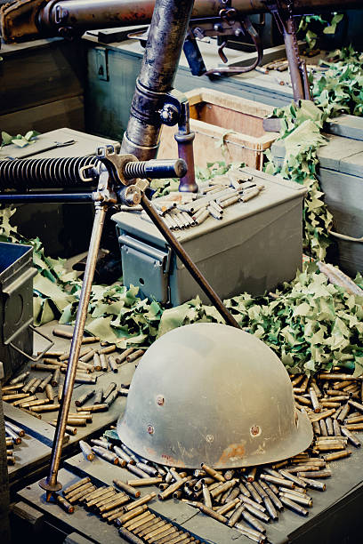 istock Old military helmet and bullets 490658839