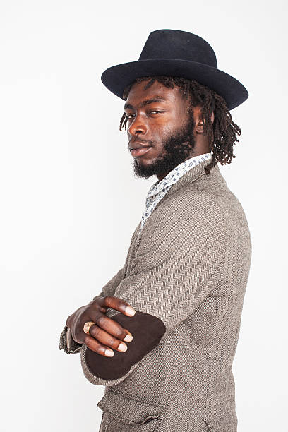 istock young handsome afro american boy in stylish hipster hat gesturing 490659564