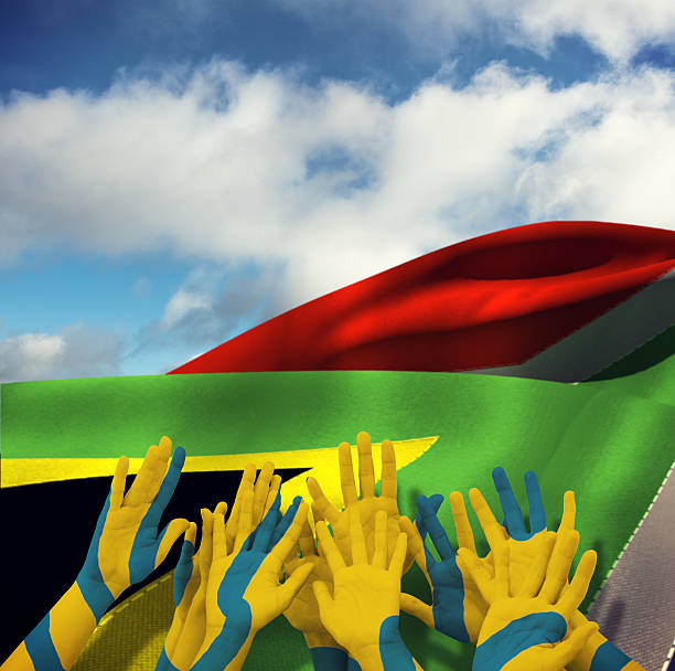 istock Composite image of people raising hands in the air 490661162