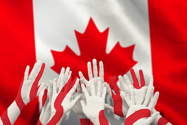 istock Composite image of people raising hands in the air 490661944