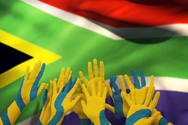 istock Composite image of people raising hands in the air 490662088