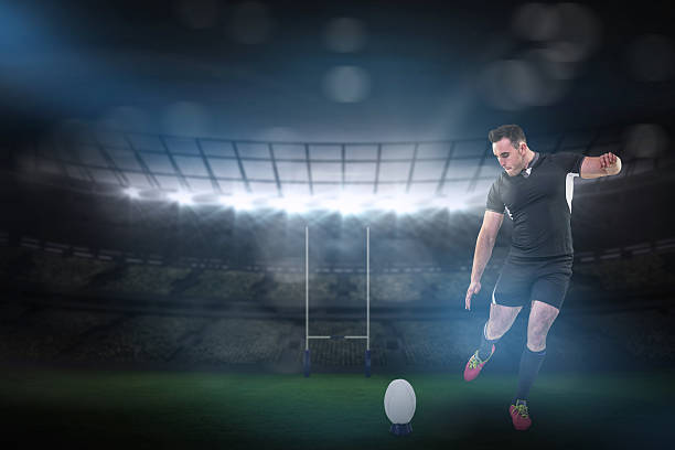 istock Composite image of rugby player kicking the ball 490662764