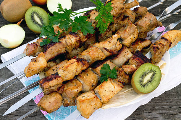 istock Pork with kiwi on the wooden table 490664612