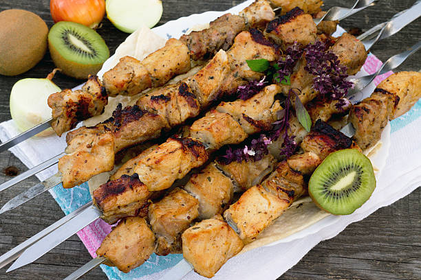 istock Pork with kiwi on the wooden table 490664784