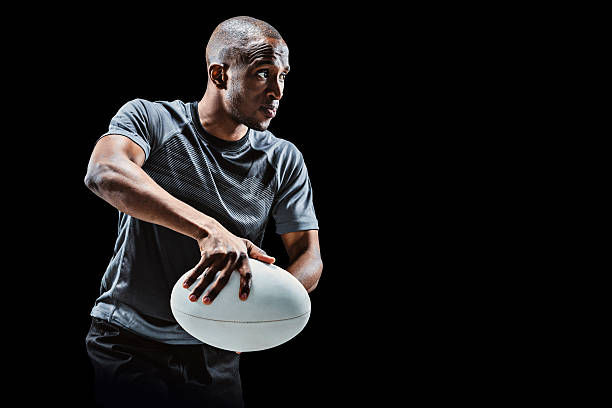 istock Composite image of rugby player holding ball 490665726