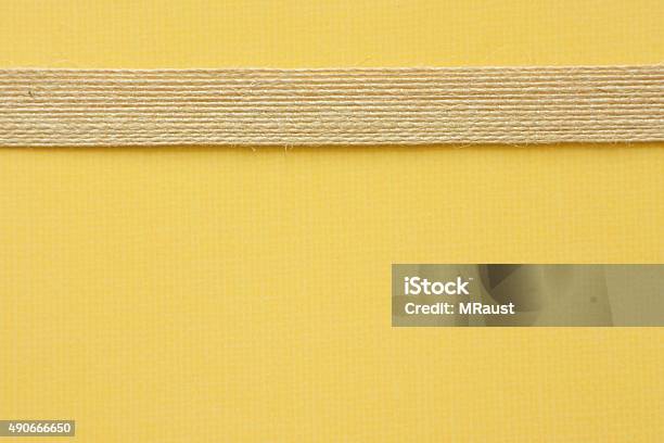 Golden Yellow Paper And Ribbon Stock Photo - Download Image Now - 2015, Art And Craft, Arts Culture and Entertainment