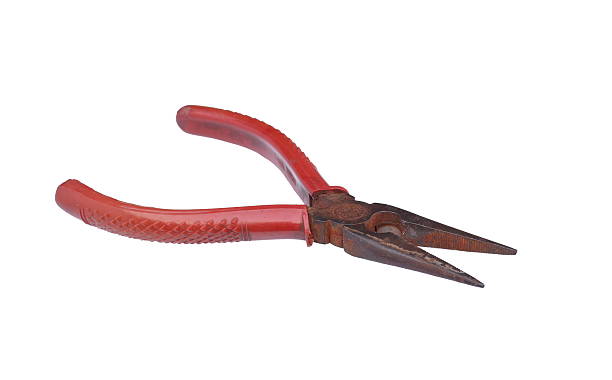 Used needles-nose pliers. Closeup of needles-nose pliers isolated on white background. nub stock pictures, royalty-free photos & images