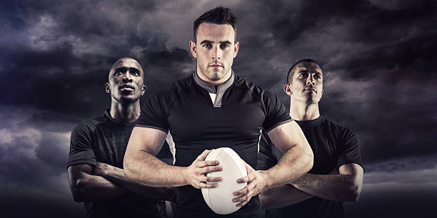 imagen compuesta de tough jugador de rugby mirando a la cámara - clothing team sport serious viewpoint fotografías e imágenes de stock