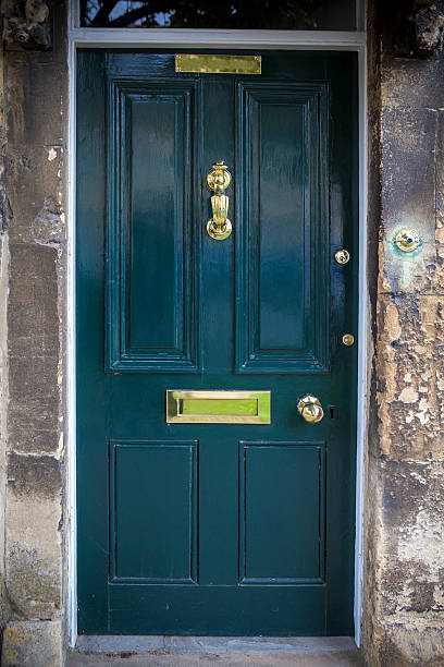istock Old Entrance Door with knocker 490668916