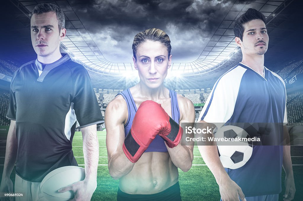 Composite image of fit people Fit people against rugby stadium 20-24 Years Stock Photo