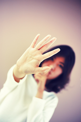 Asia Woman showing stop hand