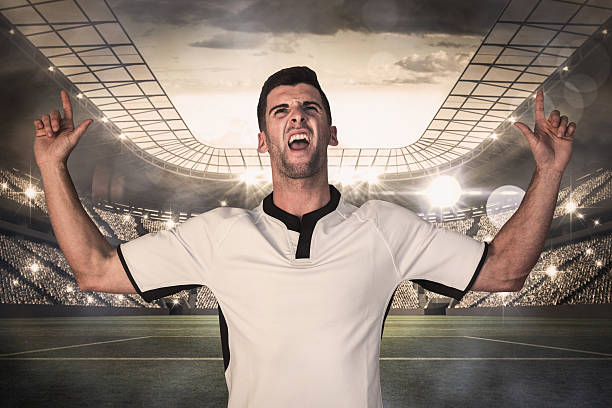 istock Composite image of excited rugby player pointing up 490671690