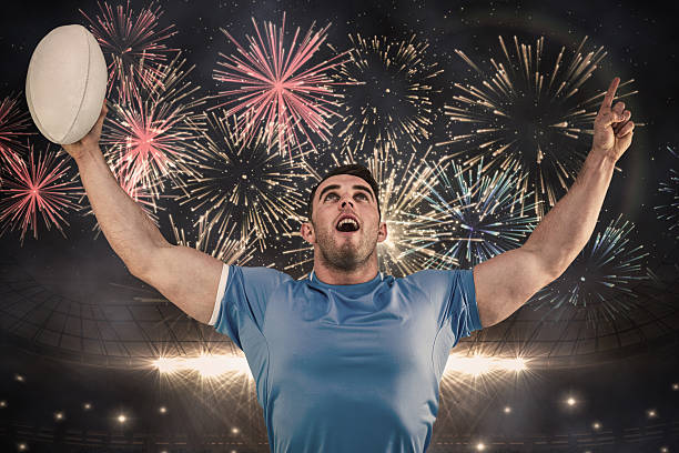 istock Composite image of rugby player cheering and pointing 490672318