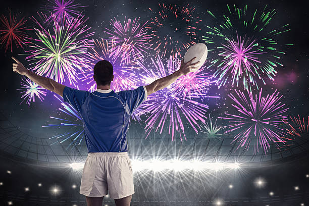 istock Composite image of cheering rugby player 490672354