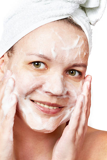 istock Woman clears a face skin foam 490673336