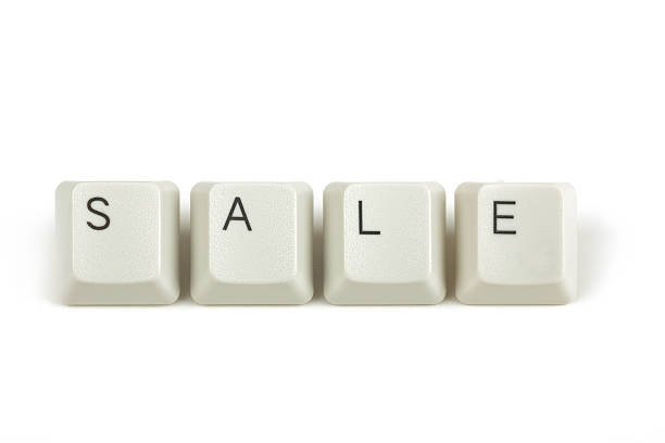 istock sale from scattered keyboard keys on white 490673686