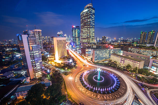Roundabout HI Jakarta Landmark at Night Selamat Datang Monument (Selamat Datang is Indonesian for "Welcome"), also known as the Monumen Bundaran HI or Monumen Bunderan HI, is a monument located in Central Jakarta, Indonesia. Completed in 1962, Selamat Datang Monument is one of the historic landmarks of Jakarta. indonesia stock pictures, royalty-free photos & images