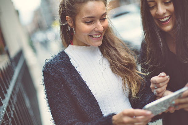 istock Fancy women in London using a mobile phone 490683278