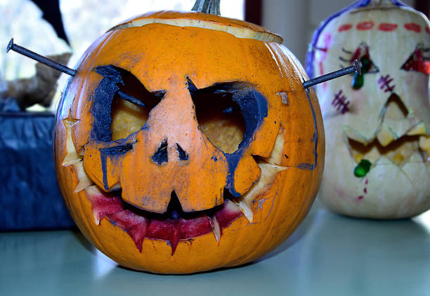 istock sinister Halloween pumpkins 490683386