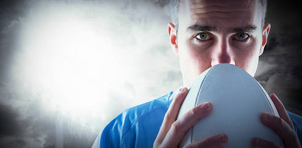 istock Composite image of rugby player holding ball 490683744