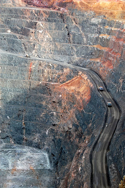 istock Trucks in Super Pit gold mine Australia 490686306